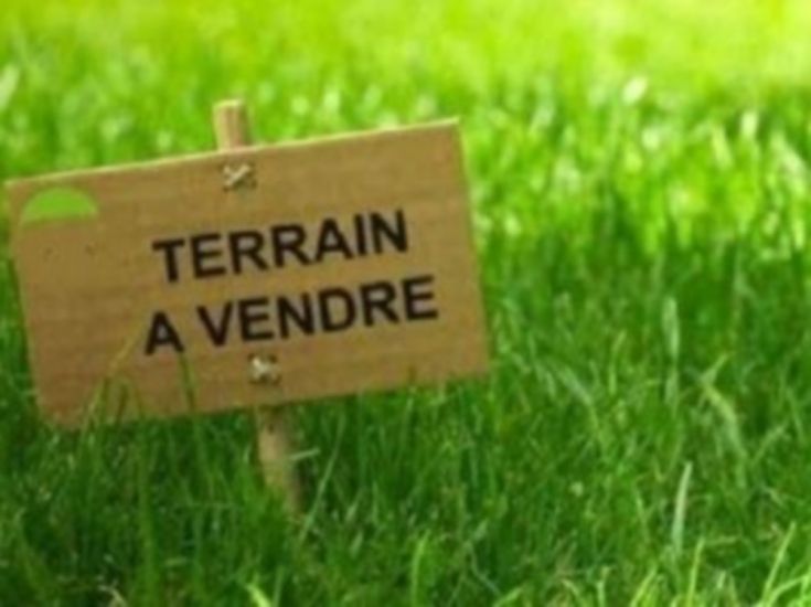Vends terrain de 72 m2 zone immeuble
