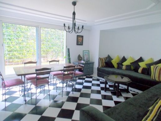salon et salle à manger accès au jardin